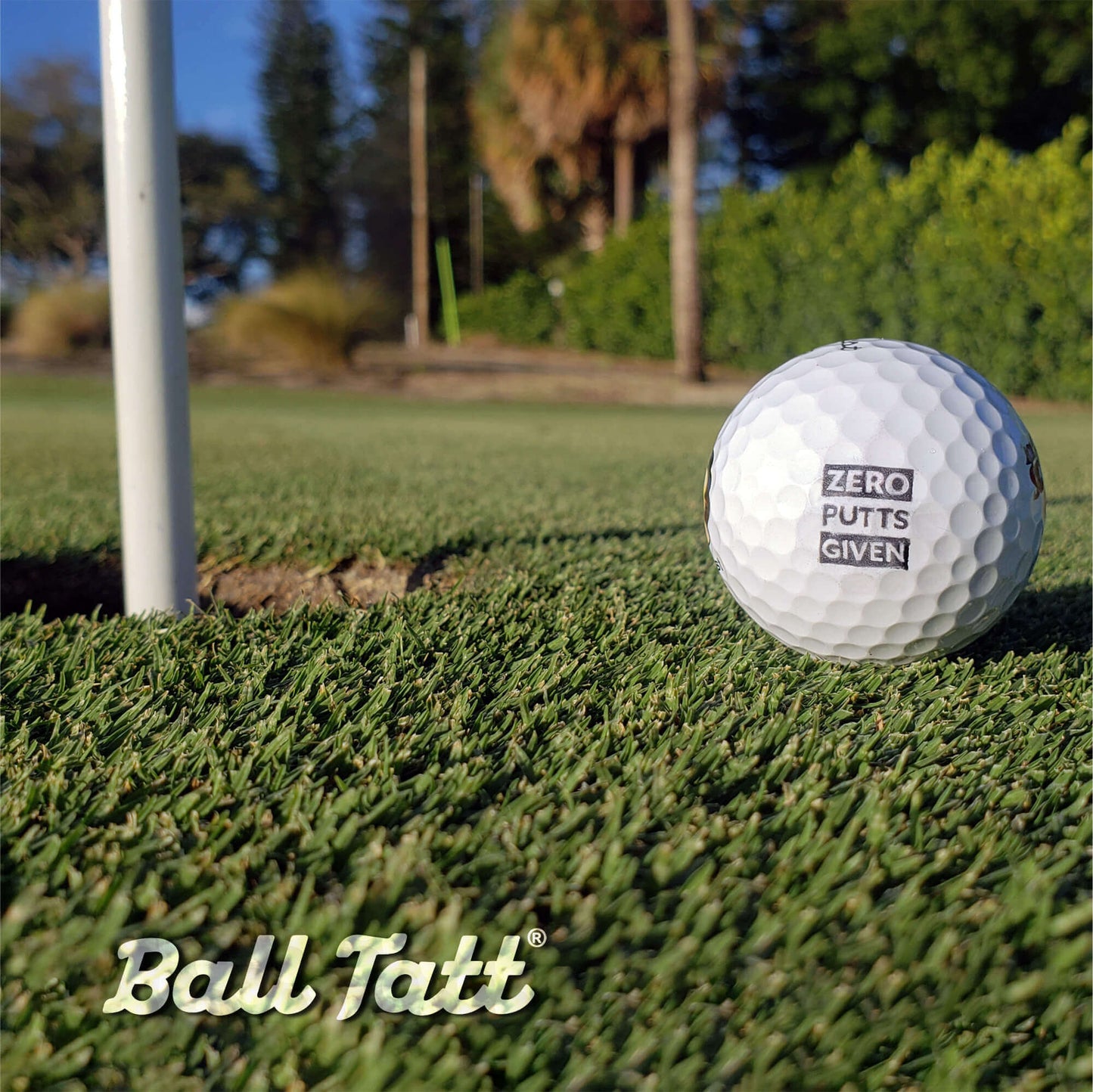 zero putts given ball tatt golf ball stamper on green